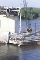 Barge Starting Move Away from Bridge