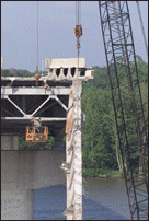 Completing Cut of Final Beam Away from Bridge