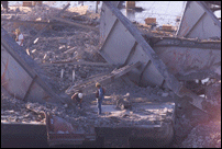 Workers Clearing Debris from North Barge
