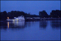 Moving Barges at Night