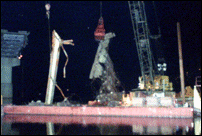 Night Work Removing Beams from River