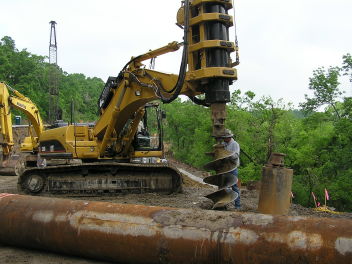 Picture showing crew drilling pier hole