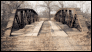 Indiana's Vincennes Bridge Company built Bridge 51E0930N4140009 in 1911. A heavily built, 80-foot Warren pony truss with a polygonal top chord, it spans a creek near Boynton in Muskogee County.