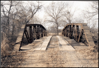 An 80-foot Warren pony truss with a polygonal top chord.