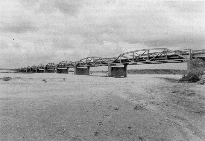Standard 100-foot camelback spans form Bridge 3416 0050X over the Red River in Jefferson County.