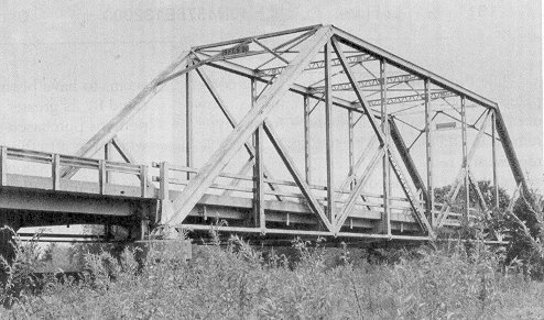 The King Bridge Company built this subdivided Warren thru truss for railroad service in 1896.  The state's oldest recorded bridge, Bridge 6744 0850 X is located on SH 9A south of Maud in Seminole County.