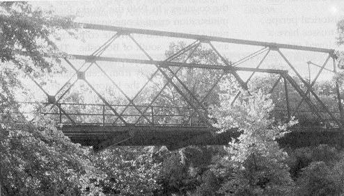 Indiana's Vincennes Bridge Company built Bridge 51E0930N4140009 in 1911.  A heavily built, 80-foot Warren pony truss with a polygonal top chord, it spans a creek near Boynton in Muskogee County.