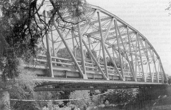 ODOT chose the K-truss as a standard bridge type during the 1930s.  A reliable and efficient design for main-traveled roads, the K-truss has been widely used throughout the state.  Bridge 5612 0480 X spans the Deep Fork of the Canadian River near Henryetta.