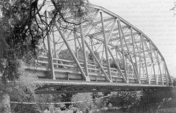 ODOT chose the K-truss as a standard bridge type during the 1930s.  A reliable and efficient design for main-traveled roads, the K-truss has been widely used throughout the state.  Bridge 5612 0480 X spans the Deep Fork of the Canadian River near Henryetta.