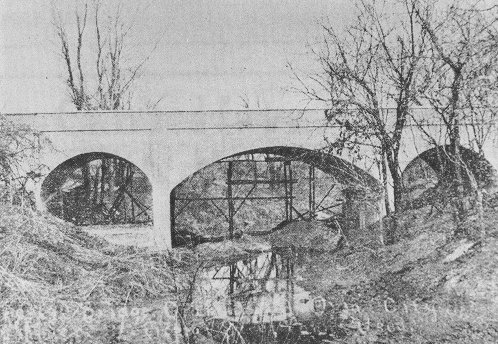 Constructing Bridge 55D3095E1020003 on Grand Boulevard in Oklahoma City in 1911.  The structure was part of an early effort to expand and beautify the city's park system.