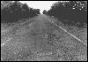 Site 12 9 foot wide paved highway Sec.7, T27N, R22E south of Miami 1926-37 alignment