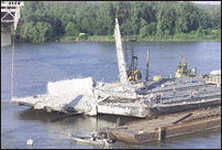 Barge Holding Final Beam from Bridge