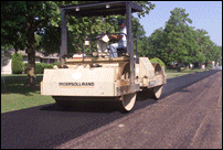 Smoothing New Asphalt on Detour Route