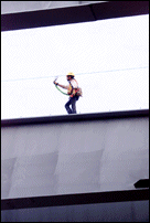 Worker Walking Steel Beam