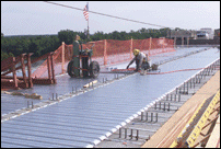 Worker Preparing Deck on Span Four